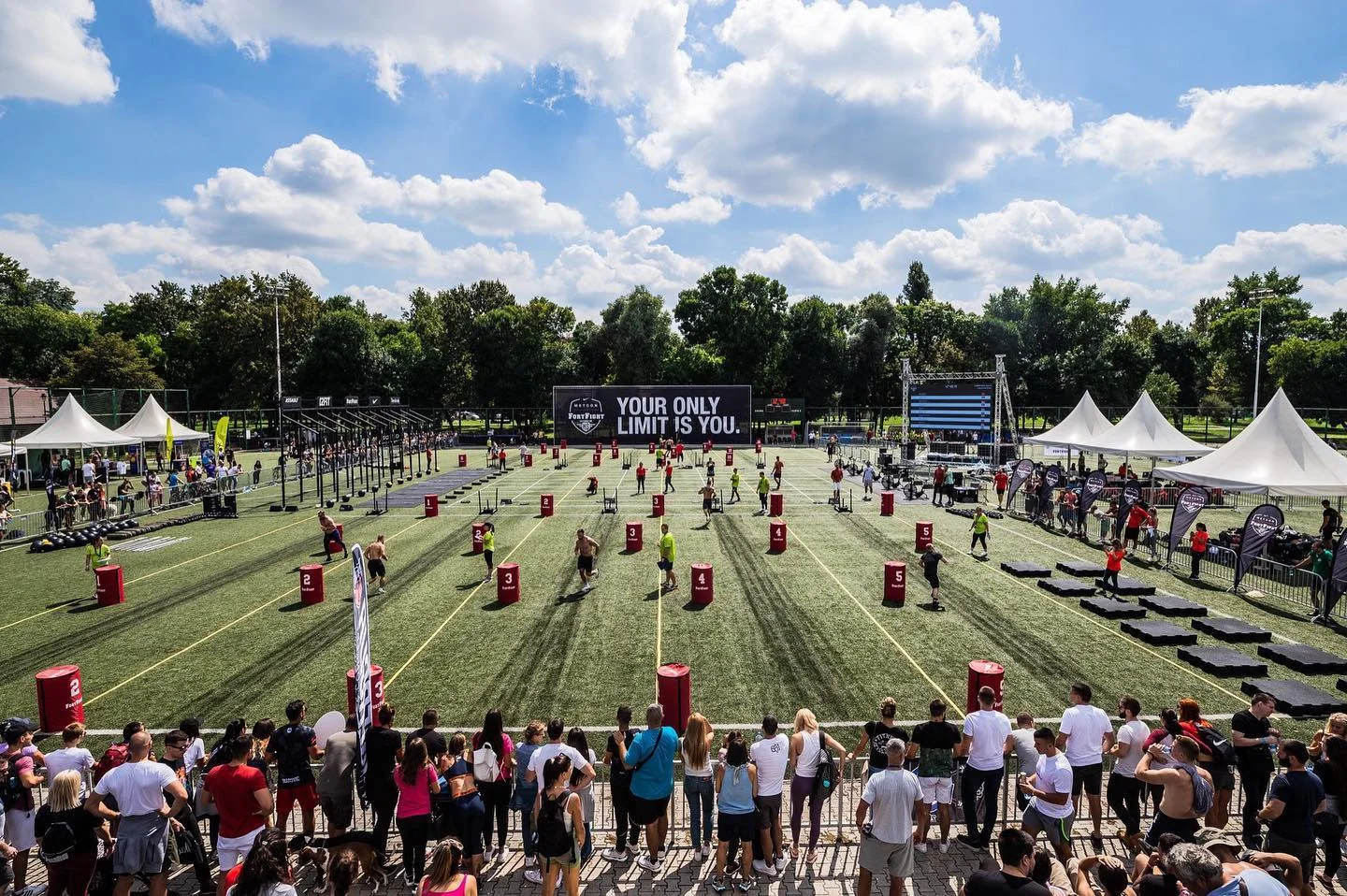 Wide view of the Nike Metcon FortFight competition field and spectators at Ada Ciganlija